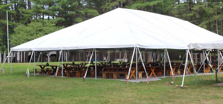 a tent in place of a dining hall at a camp that stayed open in 2020