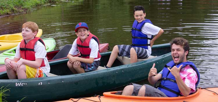 summer camp kids on lake