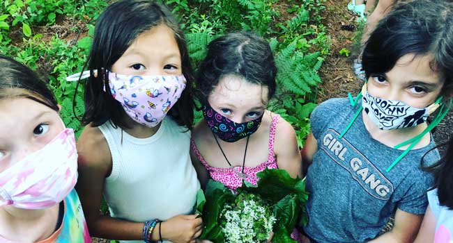 girls in masks at Camp Runoia during Summer Camp 2021 with COVID-19 Precautions