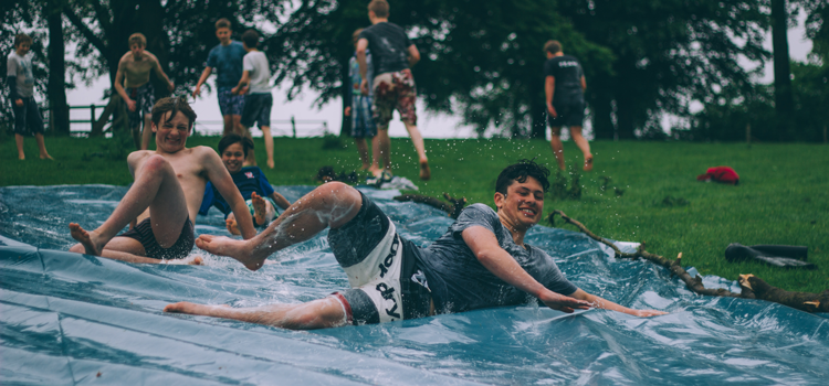 kids on a slip and slide