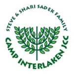 Camp Interlaken JCC logo in green.